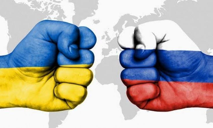"Illustration of two clenched fists painted with the national flags of Ukraine and Russia, symbolizing conflict and tension in the Russia-Ukraine War."