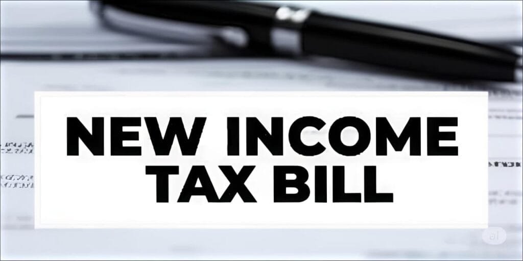 New Income Tax Bill 2025 : Text reading “New Income Tax Bill ” in bold black letters on a white background, with a blurred pen and paper in the backdrop.